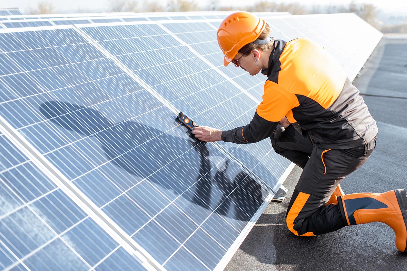 worker-installing-solar-panels-2021-09-02-01-01-29-utc